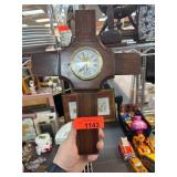 Wooden Cross Clock and Virgin Mary Figurine