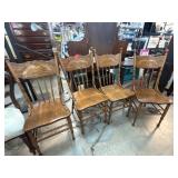 Four Wooden Dining Chairs with Carved Detail