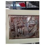 Egyptian-Inspired Relief Artwork on Metal Sheet
