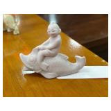Porcelain Figurine of Child on Fish