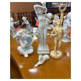 Four Figurines, Made in Japan and Signed