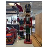 Santa and Nutcracker Figurines in Festive Attire