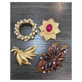 Four Decorative Brooches