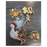 Four Colorful Costume Brooches