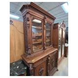 Wooden China Cabinet With Carved Animal Details