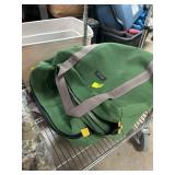 Two Green Canvas Duffel Bags