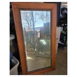 Older Wooden Framed Mirror with Ornate Details