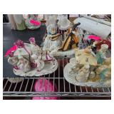 Porcelain Figurine Group Featuring Carriages and M