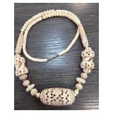 Carved Bone Beaded Necklace With Intricate Design