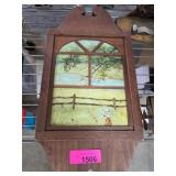 Wooden Framed Artwork and Blue Framed Print