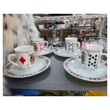 Four Playing Card Motif Cups and Saucers