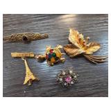 Five Decorative Gold-Tone Brooches