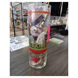 Items in a Decorative Glass Container