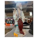 Painted Ceramic Figurine With Man and Fish