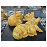 Three Yellow Cat Figurines