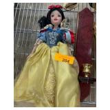 Snow White Porcelain Doll with Detailed Attire