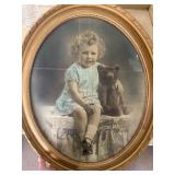 Oval Framed Portrait of Child With Teddy Bear
