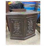 Wooden Storage Cabinet With Carved Panels