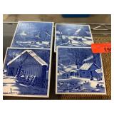 Four Blue and White Decorative Tiles