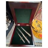 Three Engraved Writing Instruments in Case