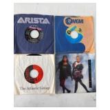 4 Assorted 45 RPM Vinyl Records