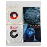 Four 7-Inch Vinyl Records