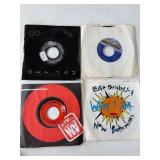 4 Vinyl 45 RPM Records in Sleeves