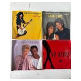 Four Record Sleeves Featuring Various Artists