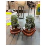Green Stone Foo Dog Statues on Wood Stands