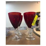 Four Red Glass Goblets with Ornate Stems