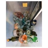 Glass Bottles and Framed Artwork