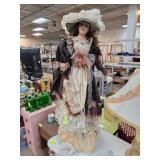 Porcelain Victorian-Style Doll with Intricate Atti