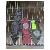Three Ornamental Metal Doorplates With Designs