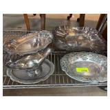 Four Silver-Colored Serving Pieces