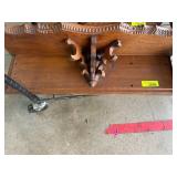 Carved Wooden Wall Shelf with Decorative Details