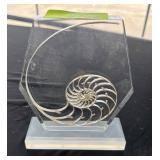 Clear Acrylic Display with Spiral Shell Design