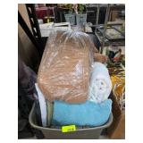 Linens and Blankets in Storage Bin