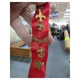 Red Ribbon With Vintage Boy Scout Pins