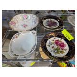 Four Floral Decorative Plates