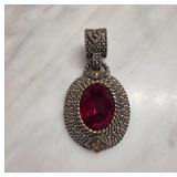Oval Pendant with Red Faceted Stone