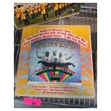 Two Vinyl Records Including Beatles and Iowa