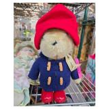 Toy Bear Wearing Red Hat and Blue Coat