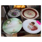 Decorative Plates with Floral and Portrait Designs