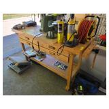 Wooden Workbench with Items in Drawers