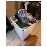 Household Items in a Plastic Bin