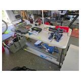 Table with Assorted Tools and Accessories