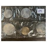 Five Commemorative Coins in Plastic Sleeves