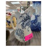 Blue and White Ceramic Pitcher with Floral Designs