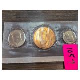 Three Commemorative Coins in Plastic Sleeve