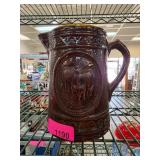 Brown Glazed Ceramic Pitcher with Cow Motif